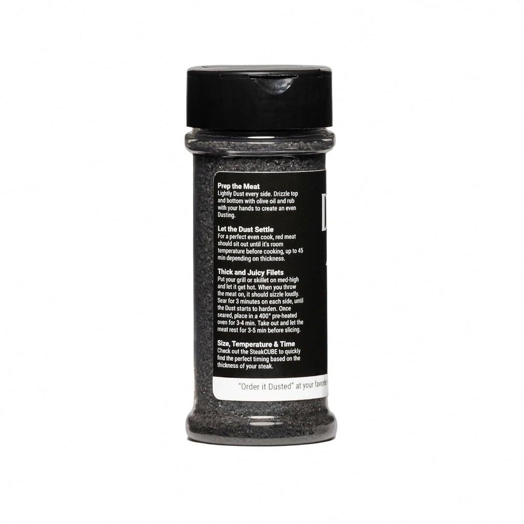 Black seasoning shaker with detailed label on preparation and cooking tips, twist cap for easy use