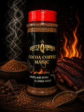 Jar of Scott's Smoked Cocoa Coffee Magic with a red lid, surrounded by coffee beans, chocolate, spices, and smoked ribs with flames.